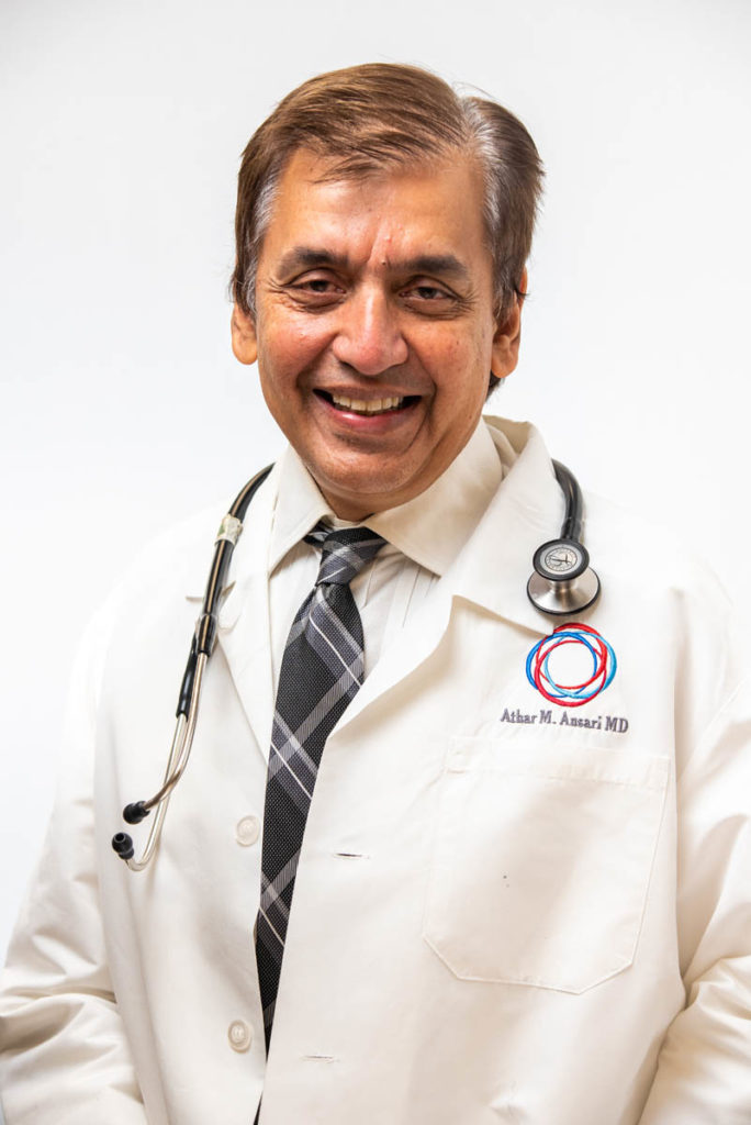 Dr. Athar Ansari, MD in white medical coat